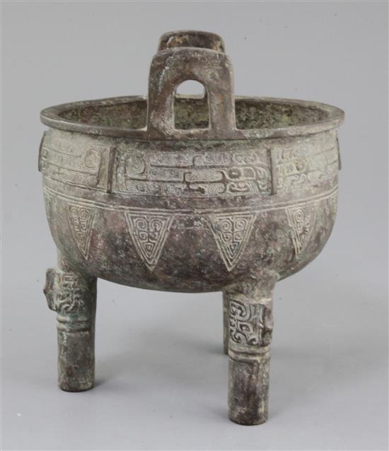 A Chinese archaistic bronze tripod ritual food vessel, Ding, early Western Zhou dynasty style, 19cm high, 16cm wide